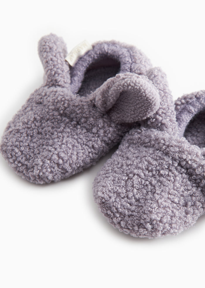 Purple teddy bear baby shoes with brand on the side and inflated plush upper.