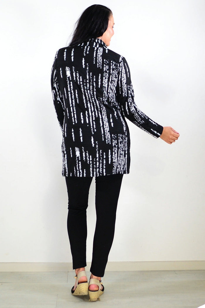 Black and white shirt jacket tunic by Hourglass, featuring a stylish, casual design with button details and a relaxed fit.