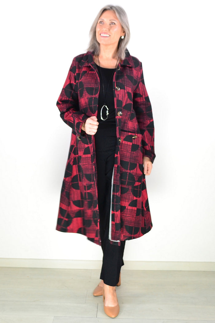 Brick red and black fleece-lined tunic jacket by Hourglass, featuring a cozy, warm design with a stylish fit.