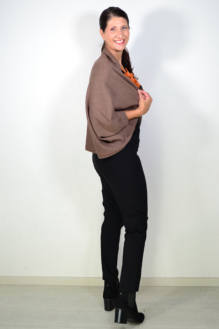 Peony brown travel cardigan wrap displayed, featuring soft fabric and versatile design perfect for cozy layering during travel.