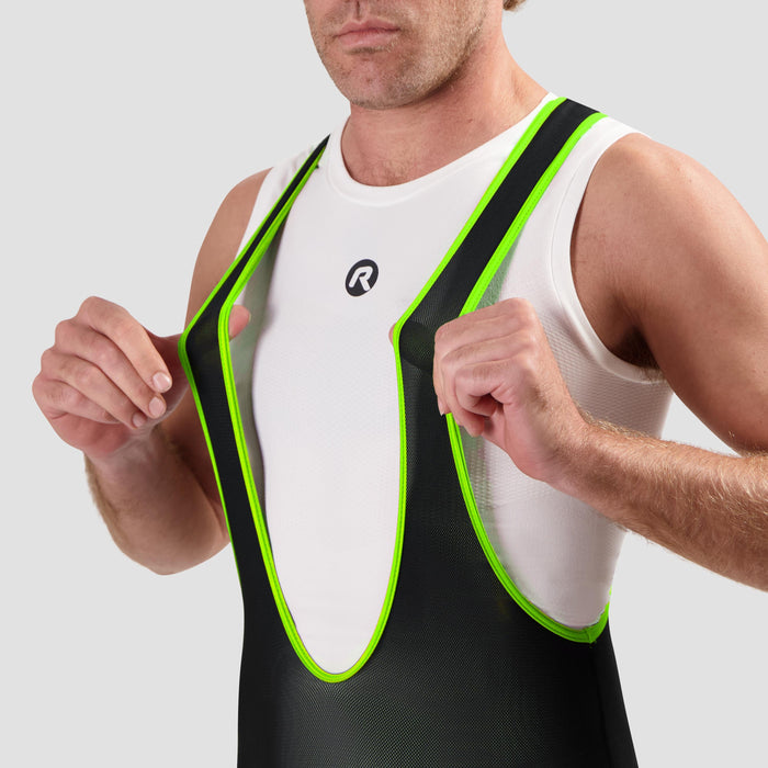 Detail van Rogelli Core korte fietsbroek heren zwart en fluor bretels.