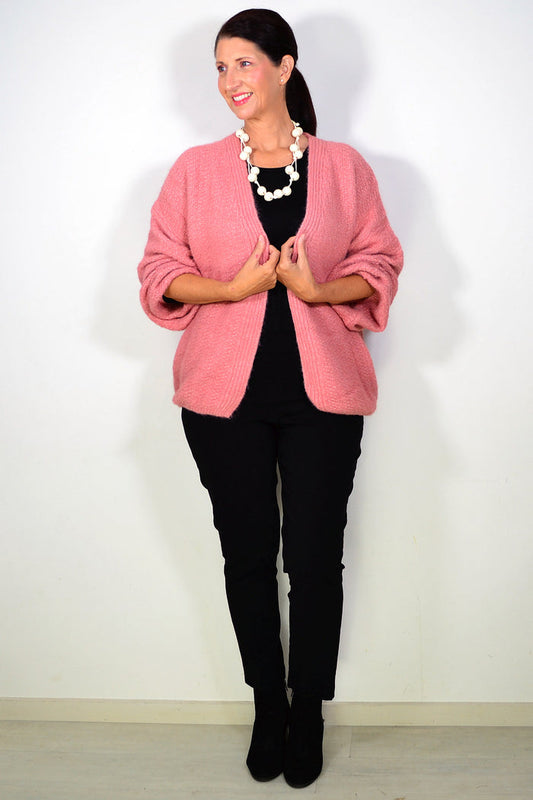 Dusty rose oversized winter cardigan by Sunshine, cozy outerwear with a relaxed fit and chunky knit texture.