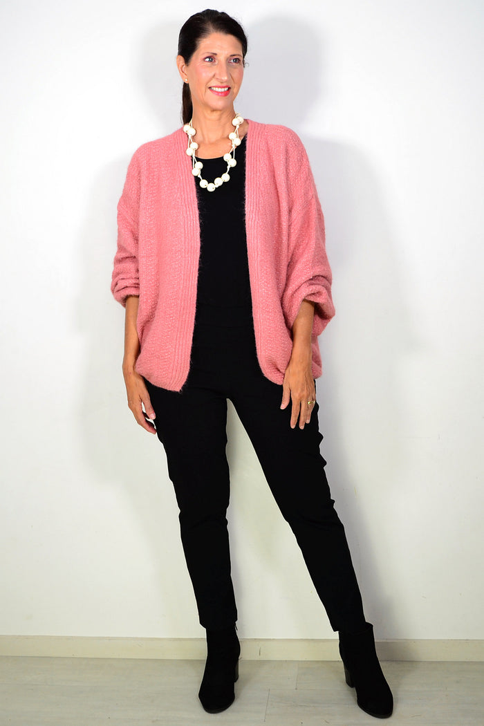 Dusty Rose oversized winter cardigan by Sunshine, cozy outerwear with a chunky knit texture and relaxed fit, displayed on a hanger.