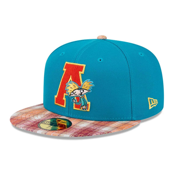 Pictured is this Letterman Hey Arnold 59FIFTY Fitted cap in turquoise. 1