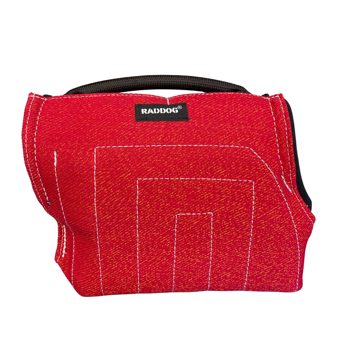 Red RADDOG Junior Short Sleeve in red Nylcot material with white reinforced stitching, a black handle, and a black RADDOG logo patch.