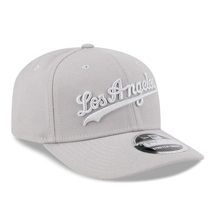 Pictured is this MLB Script LA Dodgers 9SEVENTY Stretch Snap cap in grey. 3
