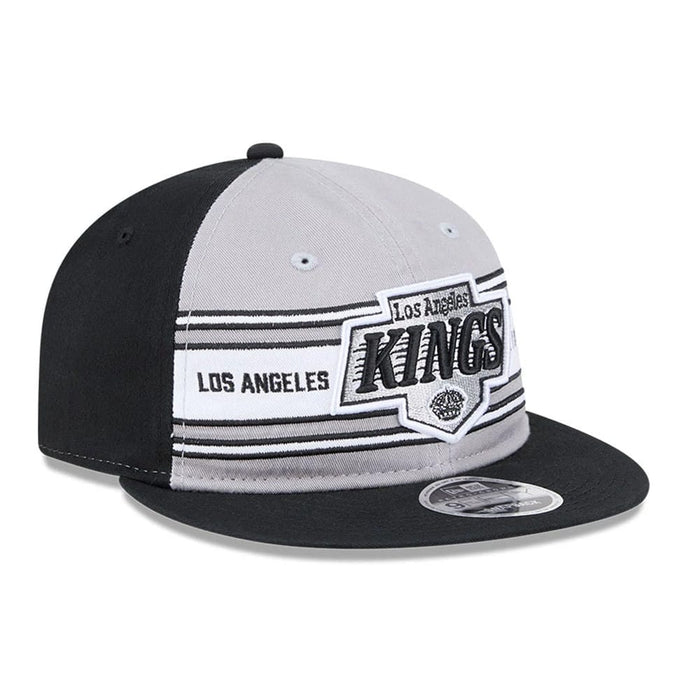 Pictured is this NHL Team Stripes LA Kings Retro Crown 9FIFTY cap in black. 3
