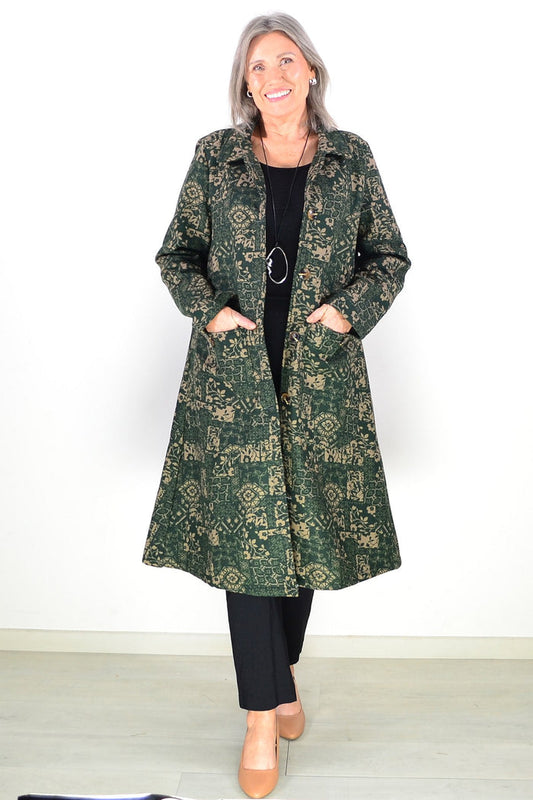 Long green beige fleece-lined tunic jacket by Hourglass, shown in image DSC_0585, stylishly layered with cozy fleece interior.