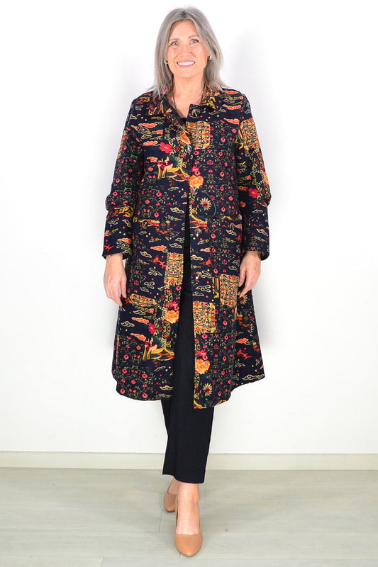 Black fleece-lined tunic jacket from Hourglass with long sleeves and a cozy, textured exterior perfect for cold weather.