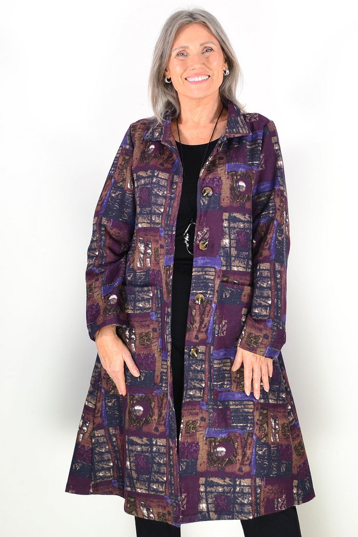 Hourglass long purple squares fleece-lined jacket, a stylish tunic with a cozy fleece interior and geometric square pattern.
