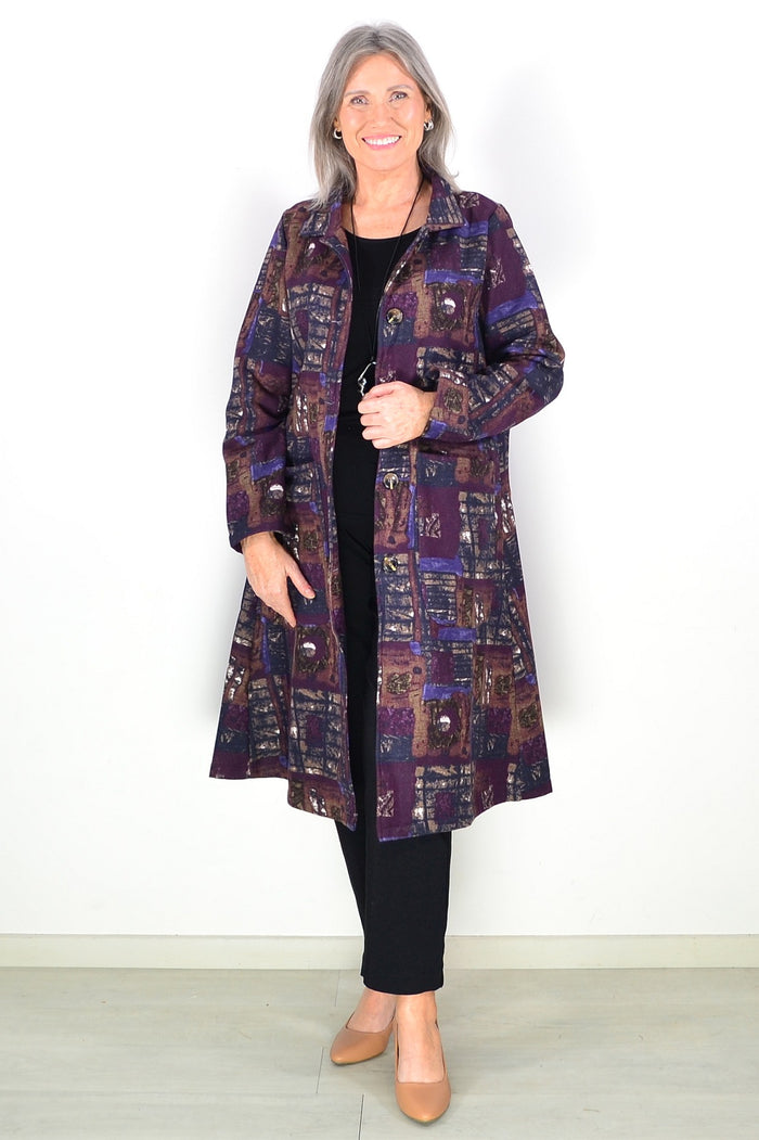 Hourglass purple fleece-lined long tunic with square pattern, featuring a cozy, stylish design ideal for casual wear.