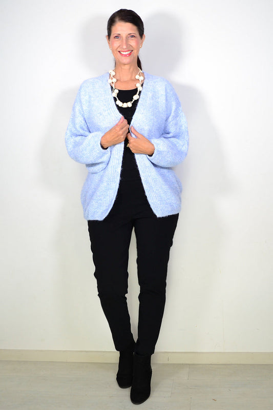 Pastel blue oversized winter cardigan by Sunshine, cozy outerwear with a relaxed fit, perfect for chilly weather.