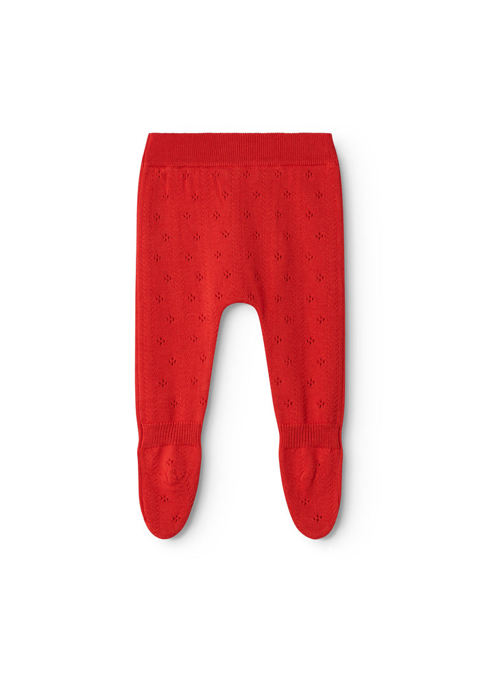Red knit trousers for baby with ribbed edge and small pattern throughout the fabric.