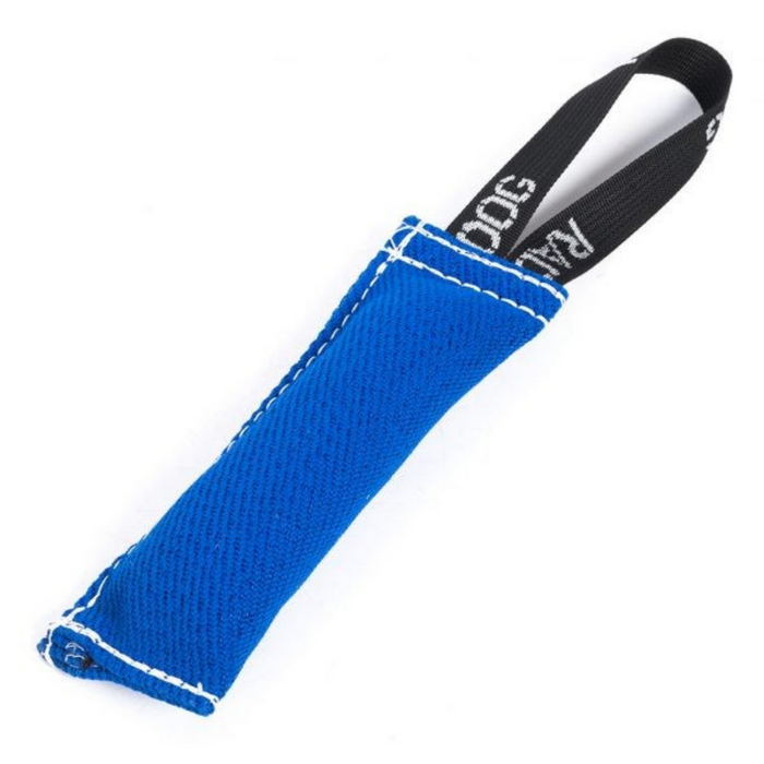 Bright blue padded dog training tug toy with a textured fabric surface, white stitching along the edges, and a black loop handle with white printed text, displayed against a light background.