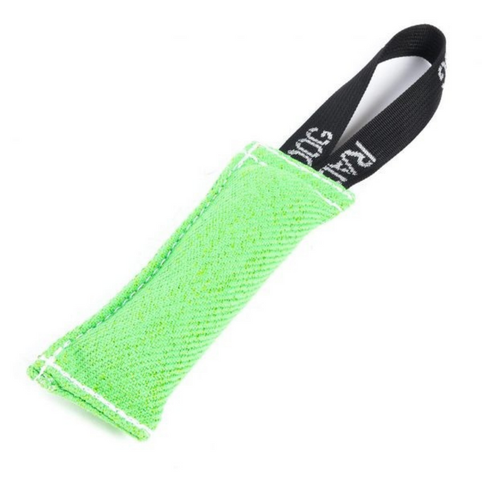 Bright neon green padded dog training tug toy with a textured fabric surface, white stitching along the edges, and a black loop handle with white printed text, displayed against a light background.