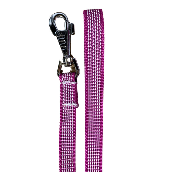 Close-up of pink anti-slip dog leash with textured webbing and stainless steel swivel clasp.