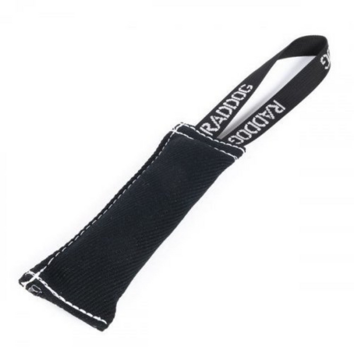 Black nylon dog tug toy with the text 'RADDOG' visible on it.