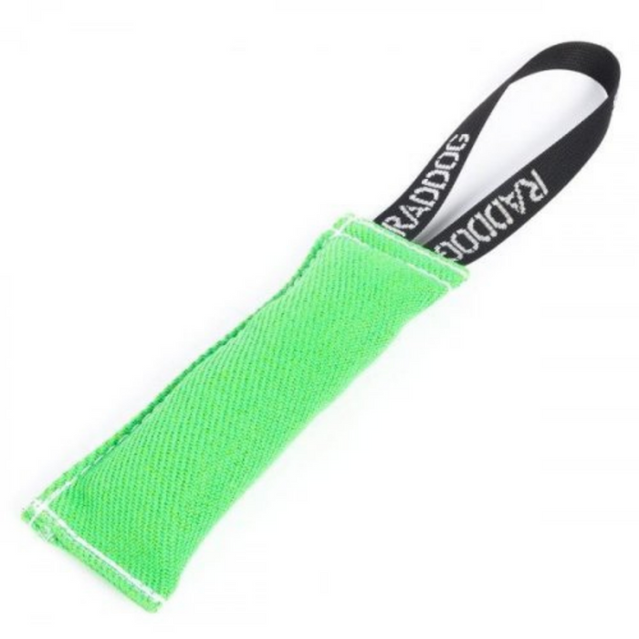 Green dog training tug toy made of durable fabric with white stitching and a black loop handle labeled “RADDOG,” isolated on a white background.