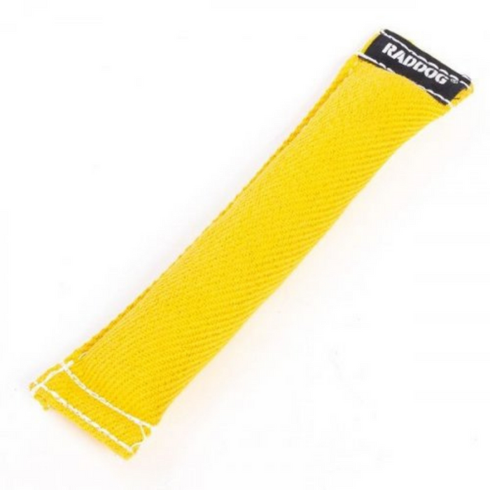 Yellow cylindrical dog training tug made of durable woven fabric, with stitched edges and a black “RADDOG” brand label on one end.