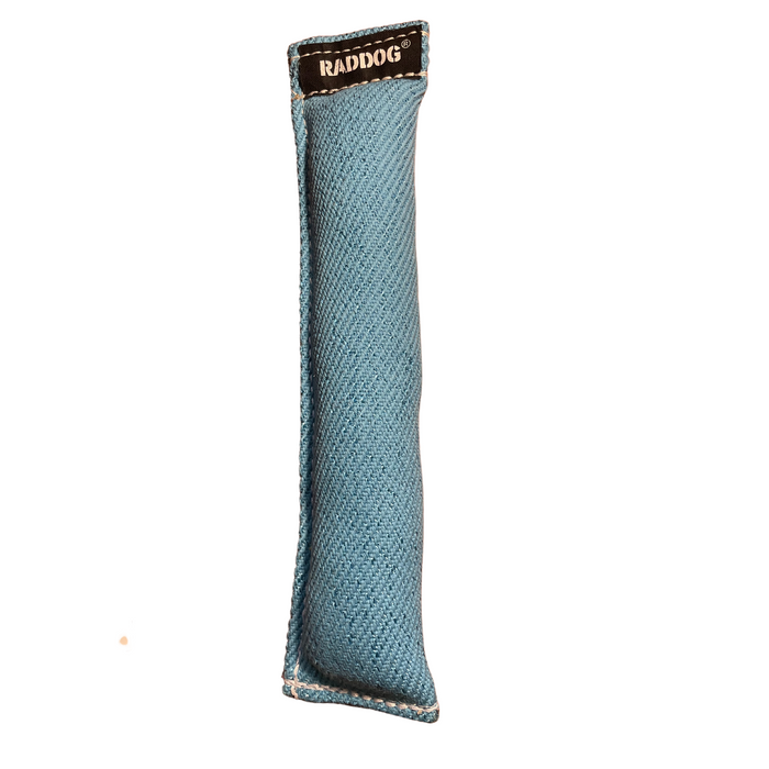 Blue cylindrical dog training tug made of durable woven fabric with reinforced stitching and a black “RADDOG” label on one end.