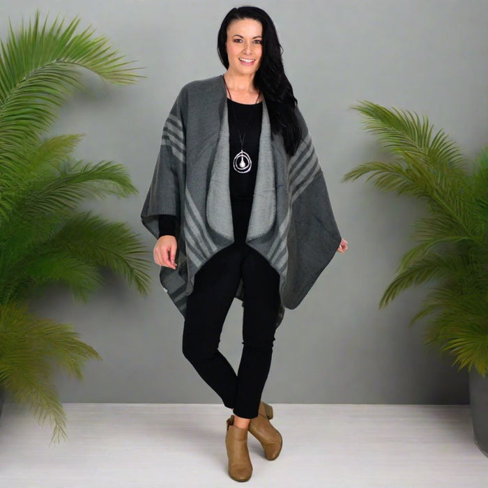 Reversible grey striped wool blend wrap from I Love Tunics, showing its soft fabric and versatile design on a model.