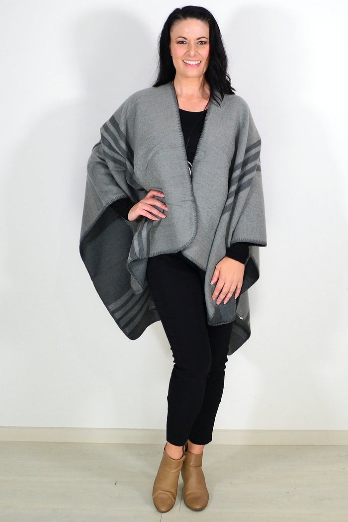 Reversible grey striped wool blend wrap by I Love Tunics, showing both solid grey and striped sides, soft and cozy fabric.