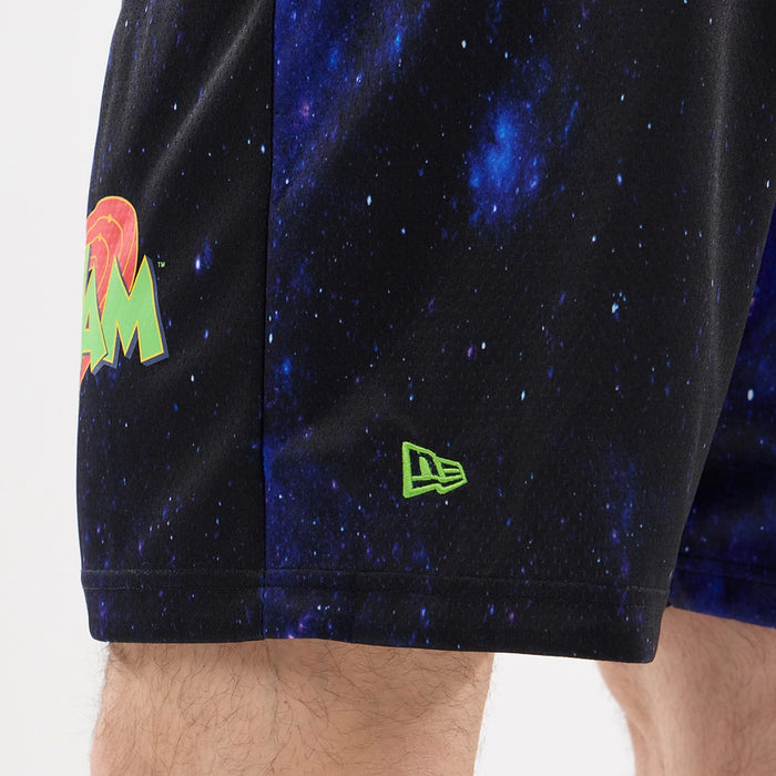 The model is wearing this Warner Brothers Space Jam Oversized Shorts in white. 5