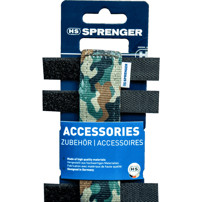 Camouflage dog collar cover displayed on HS Sprenger packaging, with black hook-and-loop fastening straps and “Accessories” label on a blue background.