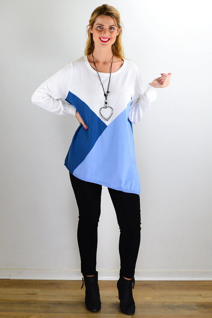 White and blue patchwork pattern jumper from I Love Tunics, showcasing its cozy outerwear design and colorful patchwork details.